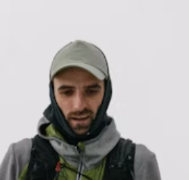 Man in hoodie and beanie